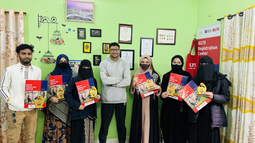 Fahim Sir poses with six happy students, each holding their official IELTS score report, showcasing a range of successful results including a Band 7, two Band 6.5s, two Band 6s, and a Band 5.5.
