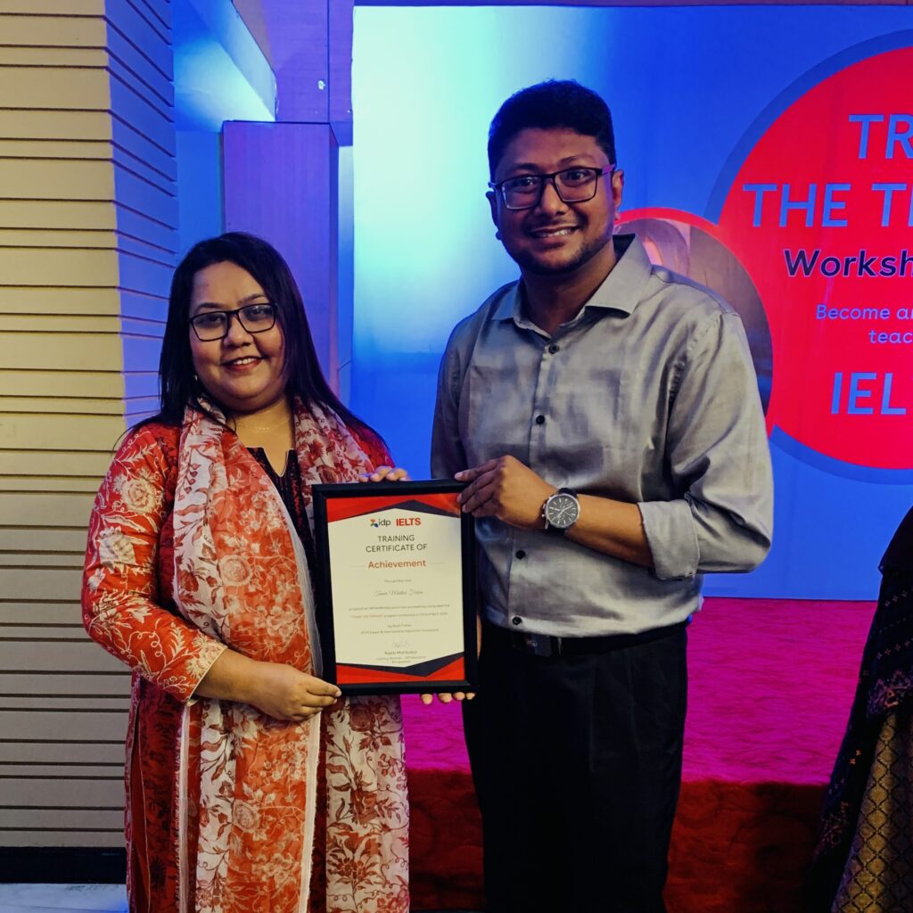 In Kulaura, Sylhet, Bangladesh, Fahim Sir proudly receives his IDP Certified Teacher certificate from Elora Sharmee, Head Of IELTS Operations at IDP Education Ltd.