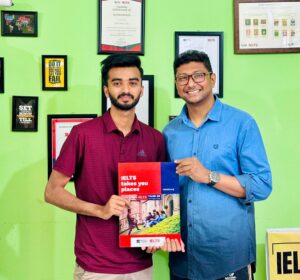 A happy student, Abdul Aziz, celebrates his IELTS success, a major achievement that will open doors for his future.