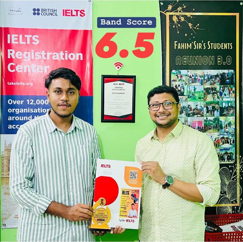 A proud moment for Sadman Sakib Joyraj, a student holding a certificate and smiling. He recently scored a Band 6.5 on his IELTS exam.
