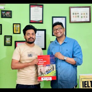 IELTS success story Tanvir Kibria student from Kulaura with Fahim Sir after achieving Band 6